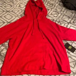 A long sleeve red sweater.